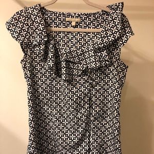 Navy and white patterned blouse